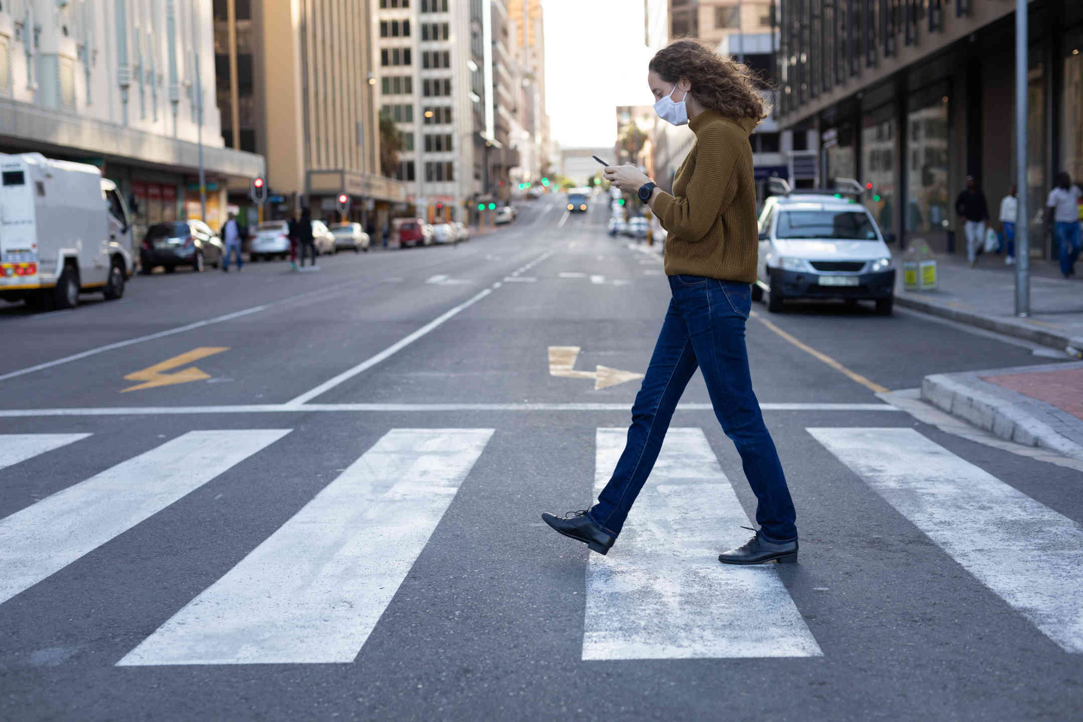 Pedestrian in a crosswalk.