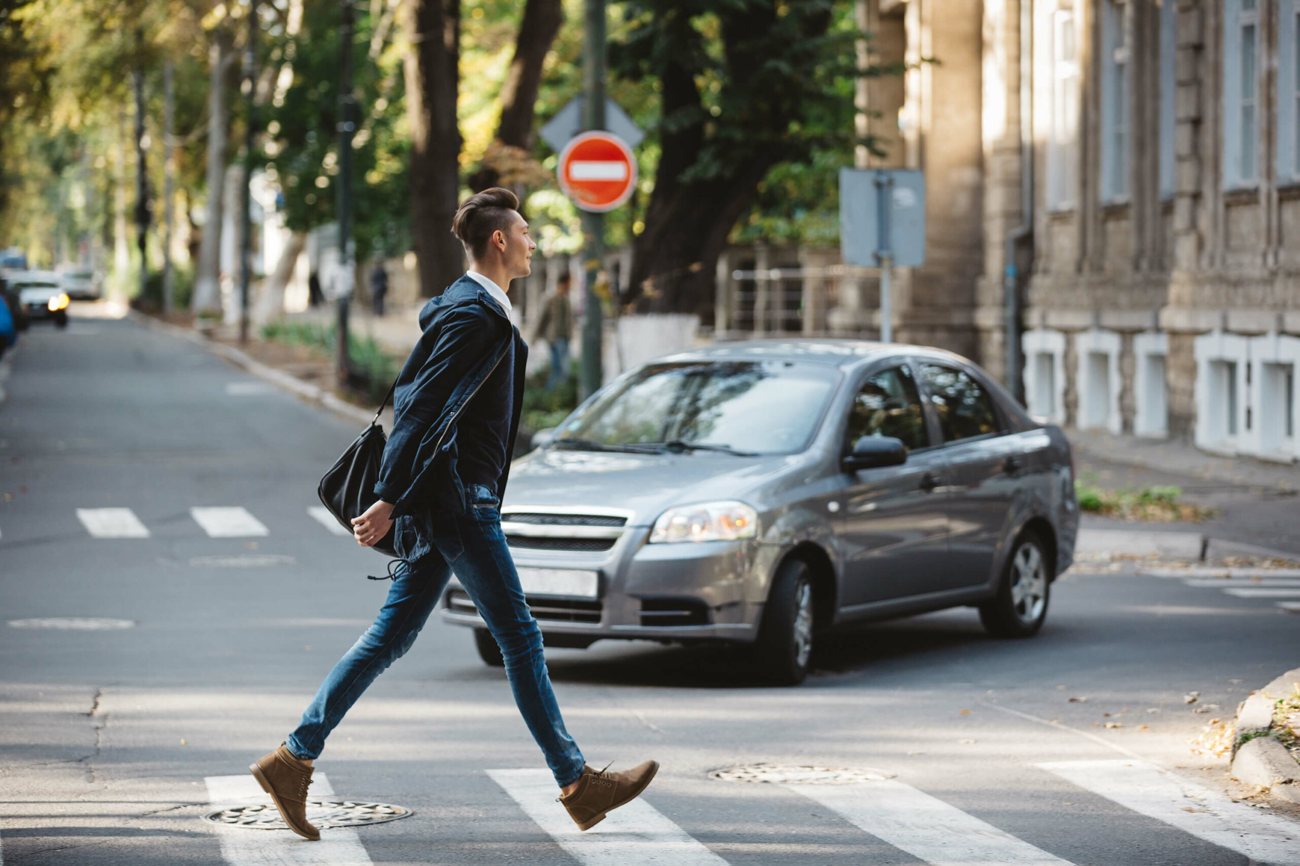 Pedestrian crossing the street.