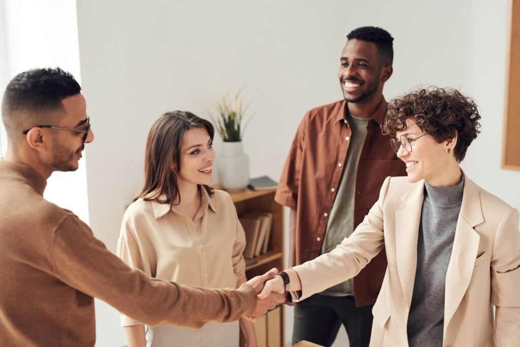 Lawyer shaking hands with a client.