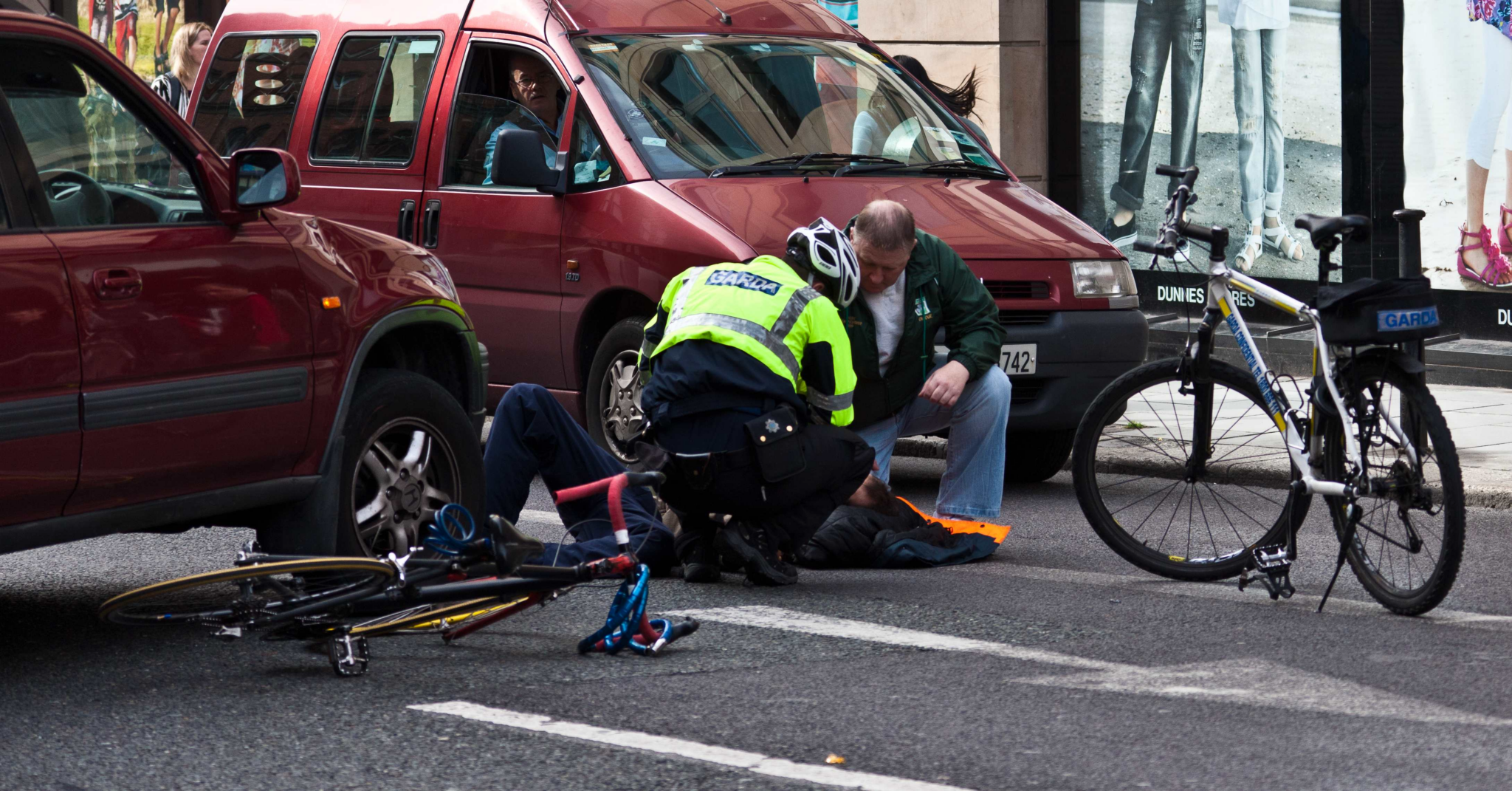 Bike accident caused by a distracted driver.