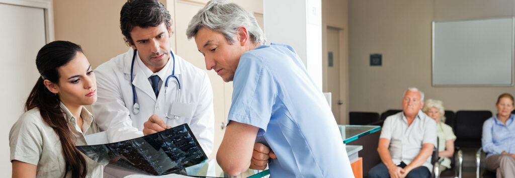 Doctor discussing medical issues with a patient.