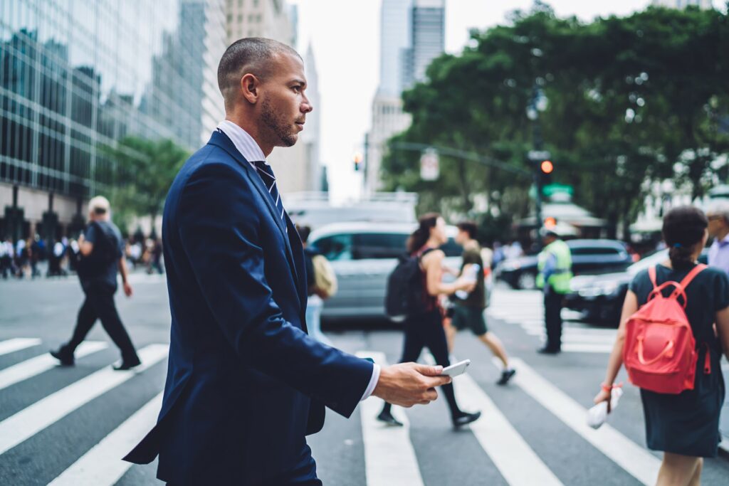 Pedestrian crossing the street while texting.